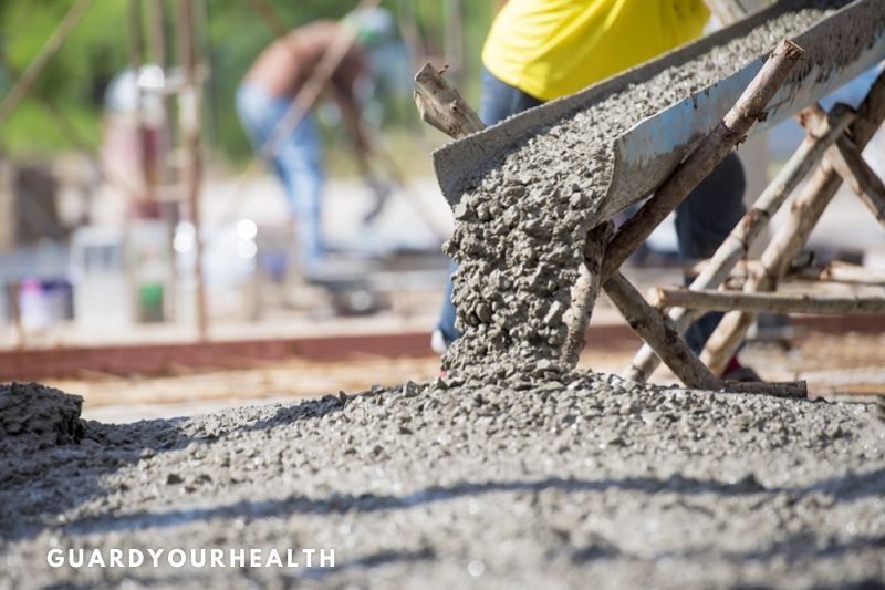 Prepare the concrete in the mixing container