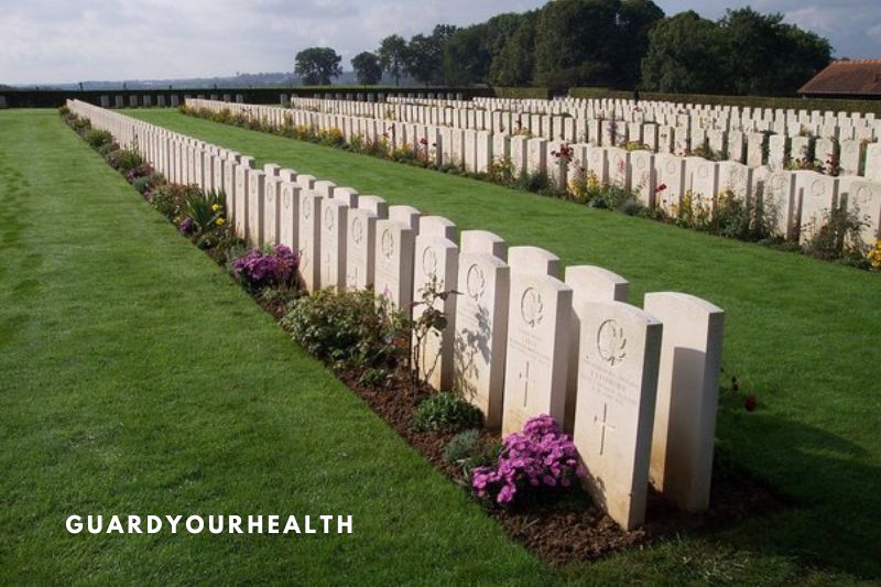 Use a shovel to trace the outline of the burial monument.